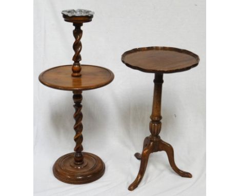 OAK SMOKERS COMPANION
with an inset metal ashtray on a barley twist column with a circular shelf, raised on a turned base, to