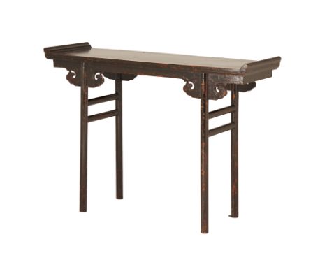 A CHINESE LACQUER CONSOLE
With scroll ends and carved spandrels
84cm high x 121cm wide x 38cm deep
Condition: Minor signs of 