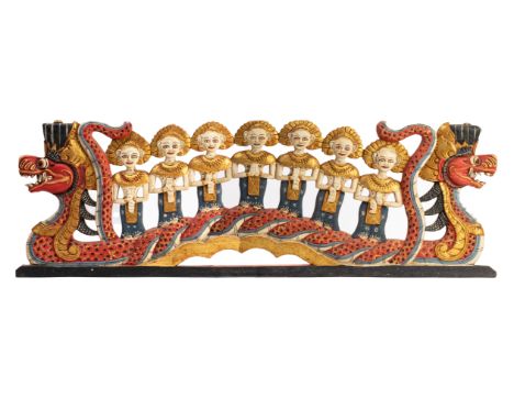 A BALINESE CARVED WOOD DRAGON BOAT PANEL
Polychrome decorated
101cm long
Condition: Minor signs of wear commensurate with age