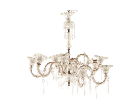 A VINTAGE EIGHT LIGHT GLASS CHANDELIER
With flower head decorated scroll branches, bead borders and pendant drops
Approx 64cm