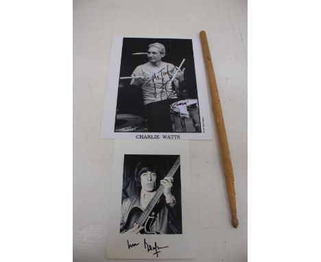 The Rolling Stones Drummer Charlie Watts -  A signed dedicated 10 x 8 black and whitephotograph signed by Charlie in Black Sh