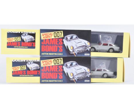 Two original Hornby made Corgi Toys boxed James Bond diecast models No. CC04203 Aston Martin DB5 in silver. The models with J