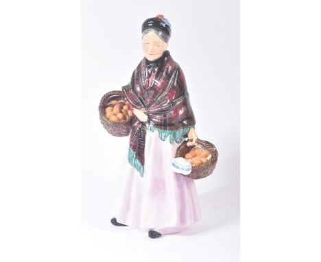 Royal Doulton – The Orange Seller - HN1759 - a hand painted ceramic figure / figurine of a standing old lady wearing a shawl 