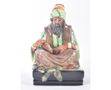 Royal Doulton – The Cobbler – HN1706– a hand painted ceramic figure / figurine of an Arabic cobbler. Early printed maker’s ma