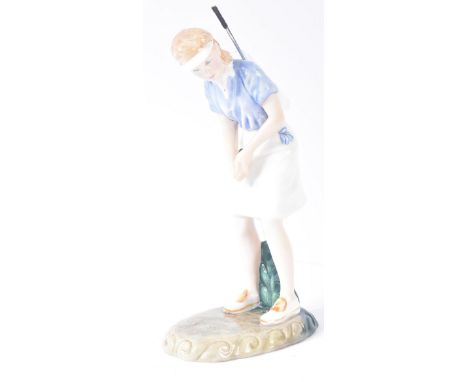 Royal Doulton – Winning Putt - HN3279 - a hand painted ceramic figure / figurine of a lady focused and positioned holding a g