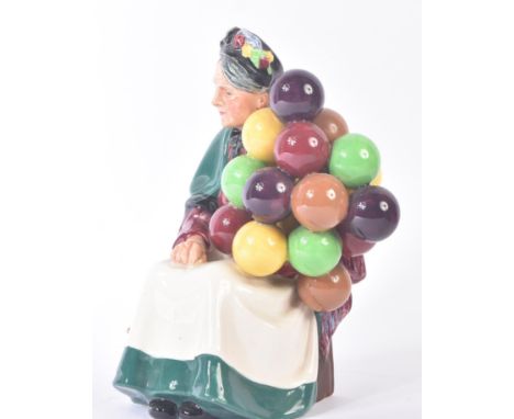 Royal Doulton – The Old Balloon Seller – HN1315 – a hand painted ceramic figure / figurine of a balloon seller lady. Maker’s 