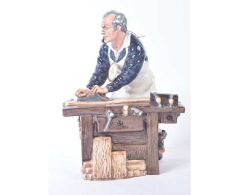 Royal Doulton – The Carpenter - HN2678 - a hand painted ceramic figure / figurine of an aged carpenter with pipe in mouth pla