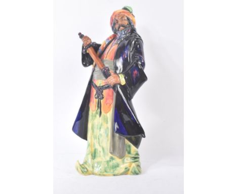 Royal Doulton – Blue Beard – HN2105 – a hand painted ceramic figure / figurine of the pirate bluebeard. Early Maker’s marks t