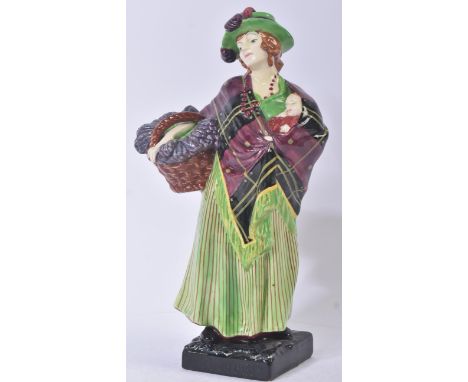 Royal Doulton – Sweet Lavender - HN1373 - a hand painted ceramic figure / figurine of a lady dressed in green with a wrapped 