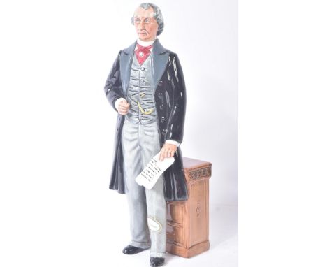 Royal Doulton – Statesman – HN2859 – a hand painted ceramic figure / figurine of a statesman holding papers before cabinet. M