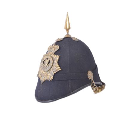 A 19th century Victorian Boer War period Connaught Rangers helmet. Blue cloth example with&nbsp;Victorian crowned officers he