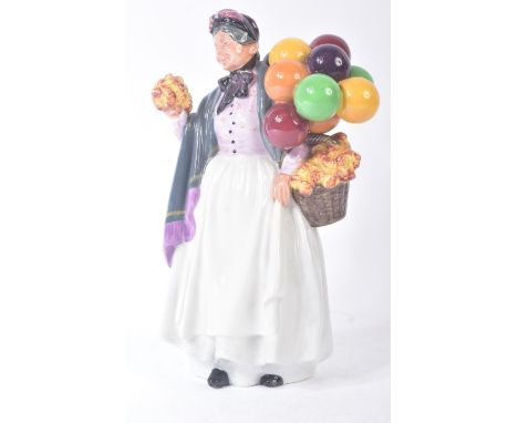 Royal Doulton – Biddy Pennyfarthing – HN1843 – a hand painted ceramic figure / figurine of a lady with flowers a basket and b