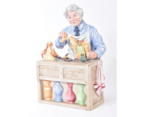 Royal Doulton – The China Repairer - HN2943 (copr 1982) - a hand painted ceramic figure / figurine of a China / ceramic repai