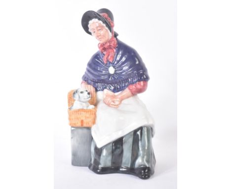 Royal Doulton – New Companions - HN2770 (copr 1981) - a hand painted ceramic figure / figurine of a seated elderly lady with 