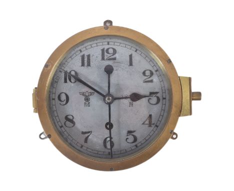 An original WWII Second World War Third Reich Nazi German Kriegsmarine U-Boat bulkhead clock. Arabic numerals, with Eagle Swa