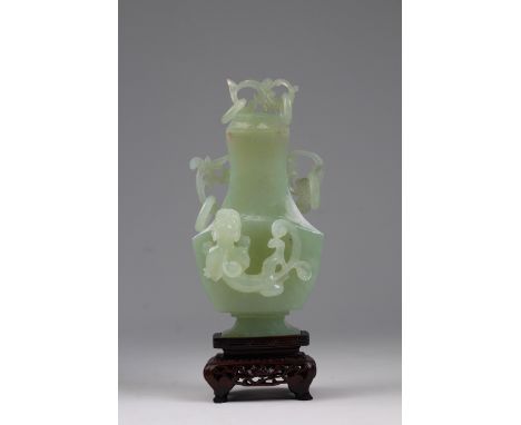 Chinese Carved Apple-Green Jade Vase on Stand with twin handles and a carved foo lion on the front side of the vase. Standing