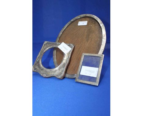 GEORGE V SILVER OVAL PHOTOGRAPH FRAME
maker Samuel M Levi, Birmingham 1925, oak back borads and fold-out easel support, 28cm 