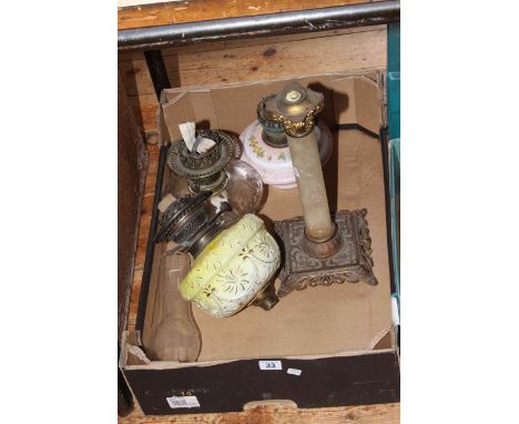 Corinthian column lamp base, three oil lamp reservoirs and burners and glass chimney.
