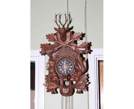 Continental double weight cuckoo clock.