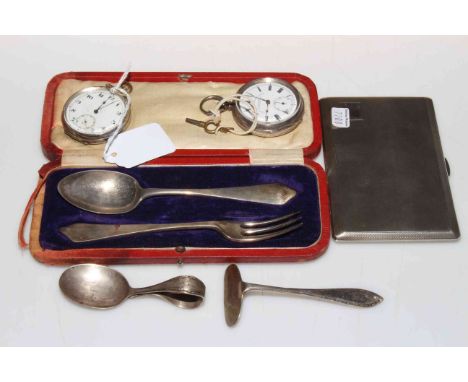 Cased silver spoon and fork, silver pusher, silver cigarette case and two pocket watches.