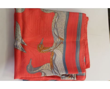 A Hermes silk Duck pattern scarf on a coral foliate patterned ground 86cm x 90cm Small staining spots.