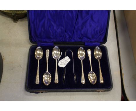 Set of silver tea spoons and tongs