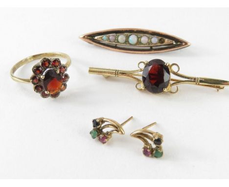 A 9ct gold garnet cluster ring, finger size P; a 9ct gold single garnet brooch; a Victorian 9ct gold opal and diamond chip br