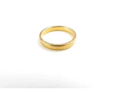 A 22 carat gold wedding ring, 3.1mm wide, finger size M, 4.6 g gross