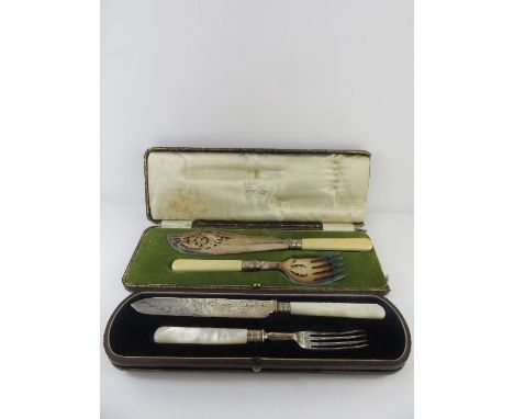 A Victorian cased silver and mother of pearl cake knife and fork set, H. Atkin, Sheffield 1884; with a cased pair of plated f