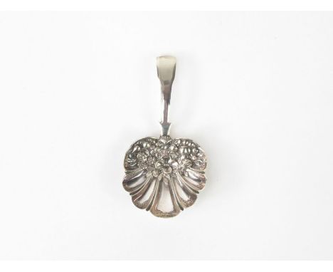 A Georgian silver caddy spoon, Samuel Pemberton, Birmingham 1817, the shell bowl embossed with flora, 8.5cm long, 9.5g gross