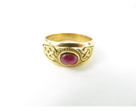 An 18ct gold Clogau ring set with an oval cabochon cut ruby, the stone approximately 6.2mm x 4.4mm, finger size X, 8.37g gros