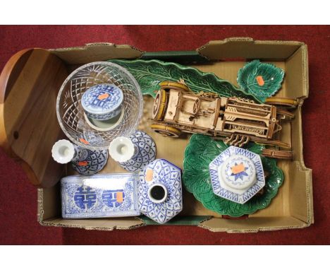 A box of miscellaneous items, to include a modern blue and white tea caddy and cover, balsa wood model of a racing car, straw