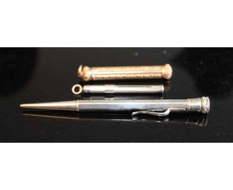 A Victorian gilt plated and chased propelling pencil; together with an engine turned silver propelling tooth-pick; and a ster