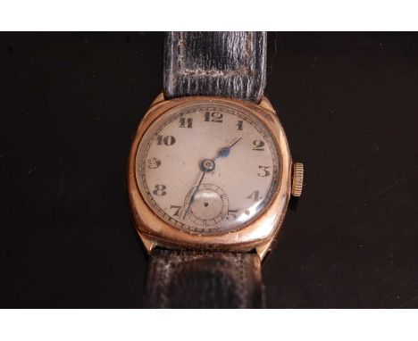 A vintage 9ct gold mechanical wristwatch, having unsigned silvered dial and on leather bracelet, case w.27mm