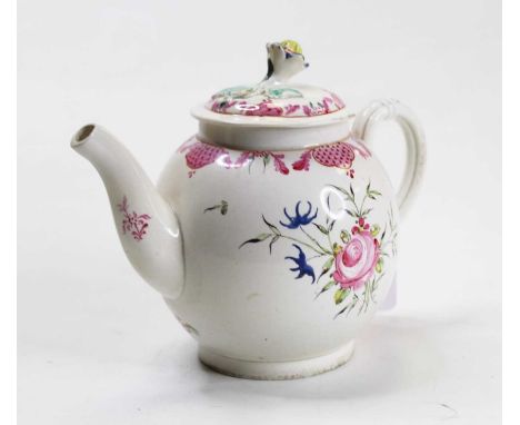 A late 18th century creamware teapot, of bullet form, the lid surmounted with floral finial, with floral and pink cross-hatch