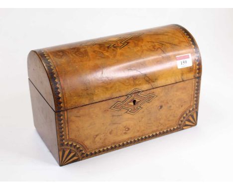 A Victorian walnut, satinwood crossbanded, ebony inlaid and chequer strung dome-topped tea caddy, having fitted twin compartm