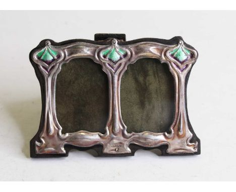 An Art Nouveau style sterling silver and enamelled double easel photograph frame, 8 x 11cm