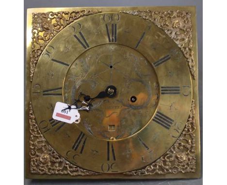 An 18th century brass longcase clock dial and movement, the four-pillar twin train eight-day movement with anchor escapement 