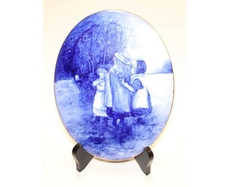 A circa 1900 Doulton Burslem porcelain plaque, transfer printed with three children, making printed Doulton Burslem England m