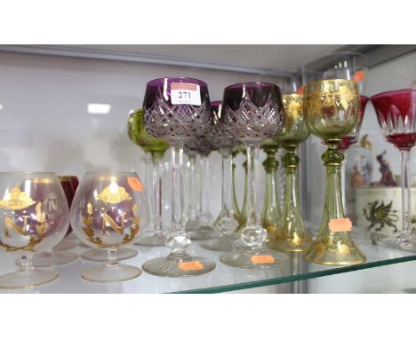 A collection of miscellaneous 19th century and later glassware to include a set of five green tinted glass goblets, each gilt