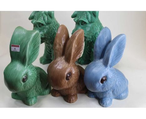 A Sylvac model of a seated long-eared bunny, model No.1028, h.25cm; together with two other similar; and a pair of Sylvac ter