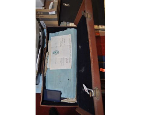 A Masonic case and contents, to include sash, The Perfect Ceremonies Craft Masonry book, Lenne Lodge letter etc