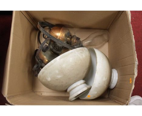 A wrought iron and copper hanging paraffin lamp with milk glass shade together with one other example (lacking framework)