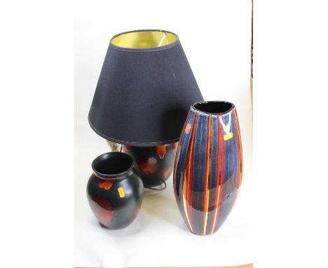 A Poole Galaxy vase, the everted rim above an ovoid body, h.20cm; together with a Poole Galaxy table lamp; and a Poole stripe