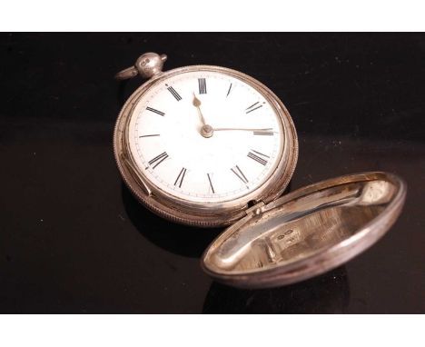 A Victorian silver cased hunter pocket watch, having an enamelled dial with Roman numerals, the keywind movement signed Georg