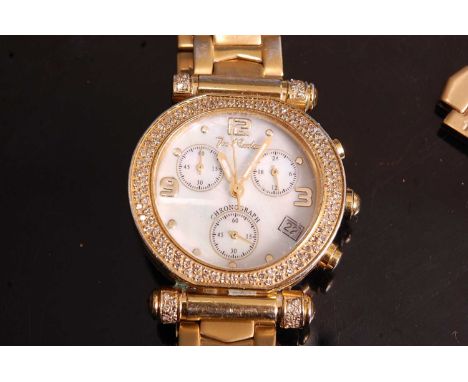 A lady's Doe Rodeo gilt metal chronograph wristwatch, having signed mother of pearl dial with date aperture at 4 o'clock, tri