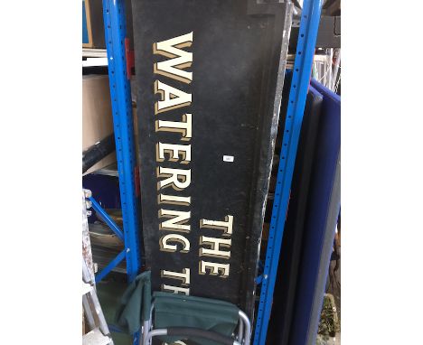 A plastic pub sign - The Watering Trough 