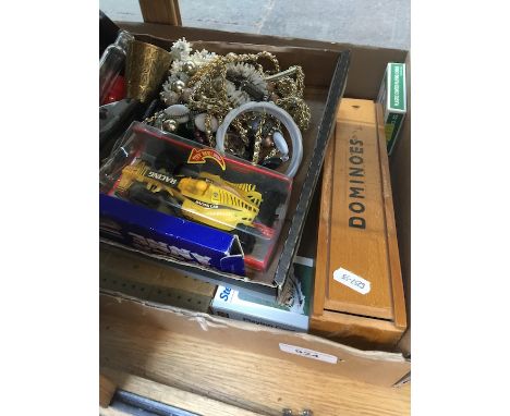 A box of bric-a-brac to include dominoes, vintage playing cards, etc 
