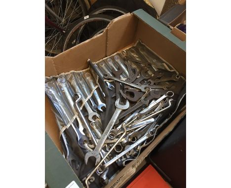 A box containing 24 piece spanner set and other loose spanners 
