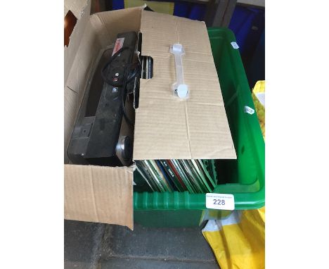 A USB record player and quantity of LPs 